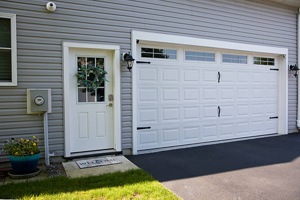 24/7 Emergency Garage Door Panel Replacement experts in Girard, KS
